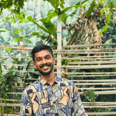 Muralidharan Vivekananthan smiling outdoors